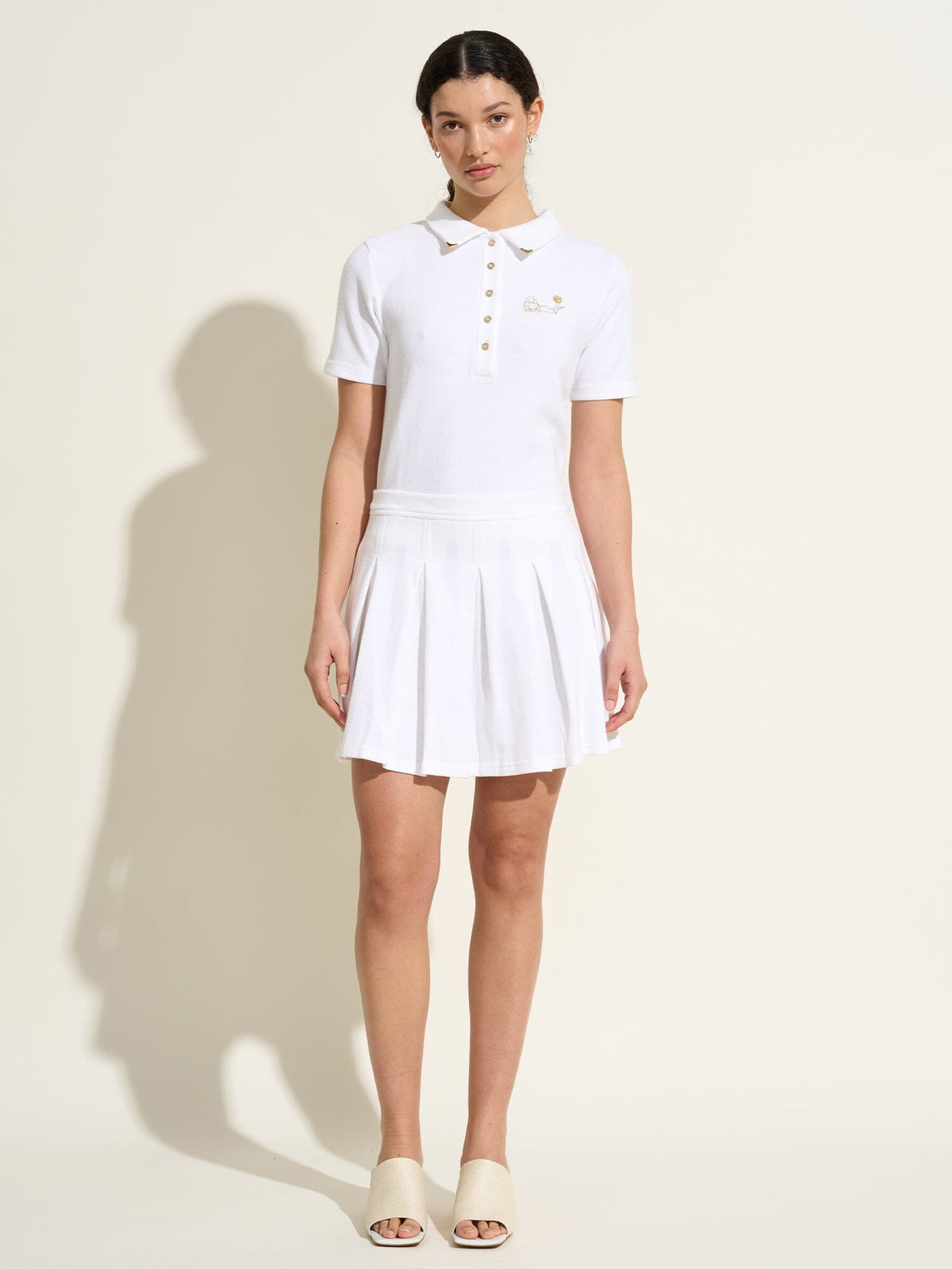 STEFFIE - Mini jupe plissée style tennis brodée en jersey piqué de coton organique Blanc Jupe Fête Impériale
